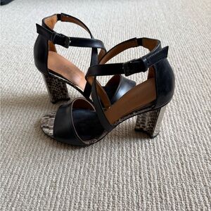 Clergerie black heels! Snakeskin detail and the toe and metal heel